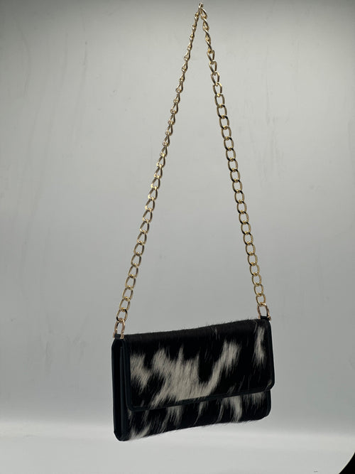Black hair on clutch
