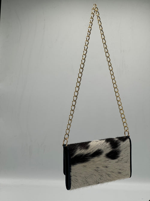 Black hair on clutch