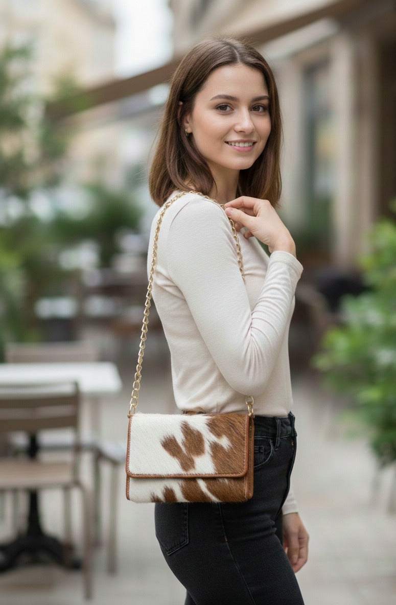 Brown hair on ladies clutch